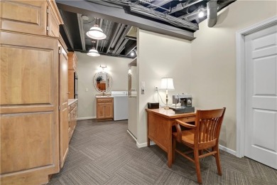 Experience refined living and ultimate privacy in this fully on Loch Lloyd Country Club in Missouri - for sale on GolfHomes.com, golf home, golf lot