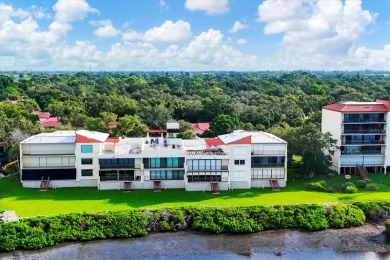Waterfront End Unit with Breathtaking Sunsets & Natural Charm! on IMG Academies Golf and Country Club in Florida - for sale on GolfHomes.com, golf home, golf lot