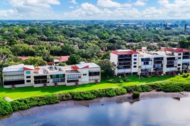 Waterfront End Unit with Breathtaking Sunsets & Natural Charm! on IMG Academies Golf and Country Club in Florida - for sale on GolfHomes.com, golf home, golf lot