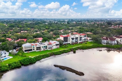 Waterfront End Unit with Breathtaking Sunsets & Natural Charm! on IMG Academies Golf and Country Club in Florida - for sale on GolfHomes.com, golf home, golf lot