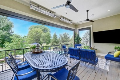 Experience refined living and ultimate privacy in this fully on Loch Lloyd Country Club in Missouri - for sale on GolfHomes.com, golf home, golf lot