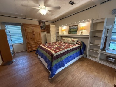 Located in Rolling Greens Village, a 55+ community in Ocala on Rolling Greens Executive Golf Community in Florida - for sale on GolfHomes.com, golf home, golf lot