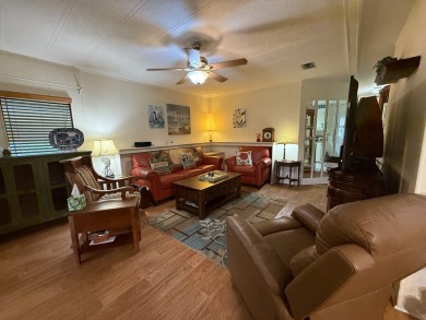 Located in Rolling Greens Village, a 55+ community in Ocala on Rolling Greens Executive Golf Community in Florida - for sale on GolfHomes.com, golf home, golf lot