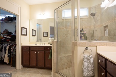 Welcome to easy, one-level living in this charming two-bedroom on Lanier Island Legacy Golf Couorse in Georgia - for sale on GolfHomes.com, golf home, golf lot