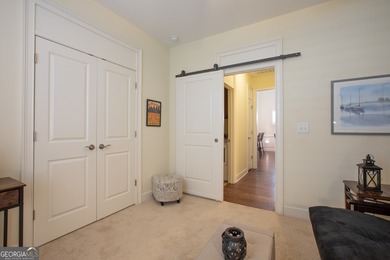 Welcome to easy, one-level living in this charming two-bedroom on Lanier Island Legacy Golf Couorse in Georgia - for sale on GolfHomes.com, golf home, golf lot