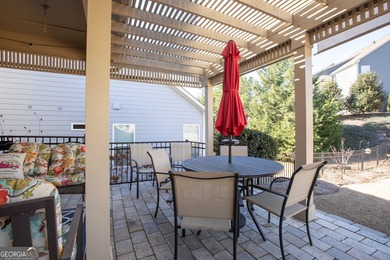 Welcome to easy, one-level living in this charming two-bedroom on Lanier Island Legacy Golf Couorse in Georgia - for sale on GolfHomes.com, golf home, golf lot