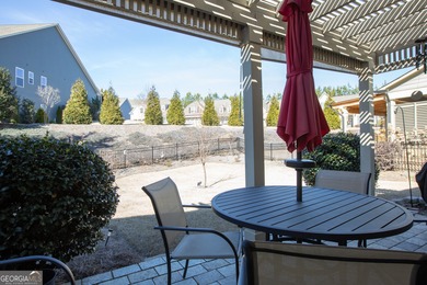 Welcome to easy, one-level living in this charming two-bedroom on Lanier Island Legacy Golf Couorse in Georgia - for sale on GolfHomes.com, golf home, golf lot