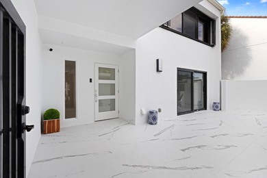 Welcome to this exquisitely re-designed and renovated from on The President Country Club in Florida - for sale on GolfHomes.com, golf home, golf lot