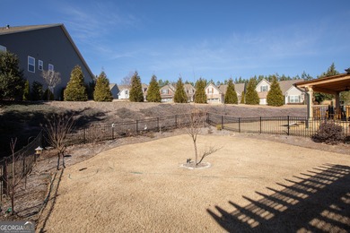 Welcome to easy, one-level living in this charming two-bedroom on Lanier Island Legacy Golf Couorse in Georgia - for sale on GolfHomes.com, golf home, golf lot