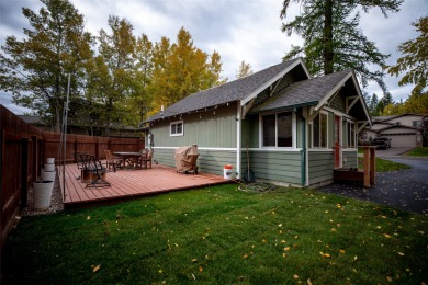 Incredible location for this adorable bungalow style home in the on Whitefish Lake Golf Club in Montana - for sale on GolfHomes.com, golf home, golf lot