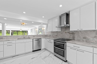 Welcome to this exquisitely re-designed and renovated from on The President Country Club in Florida - for sale on GolfHomes.com, golf home, golf lot