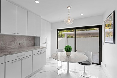 Welcome to this exquisitely re-designed and renovated from on The President Country Club in Florida - for sale on GolfHomes.com, golf home, golf lot