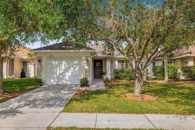 Welcome to this beautifully updated 3-bedroom, 2-bathroom home on Heritage Isles Golf and Country Club in Florida - for sale on GolfHomes.com, golf home, golf lot