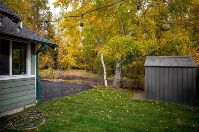 Incredible location for this adorable bungalow style home in the on Whitefish Lake Golf Club in Montana - for sale on GolfHomes.com, golf home, golf lot