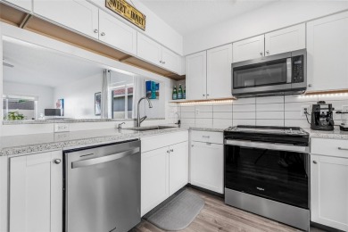 Welcome to this beautifully updated 3-bedroom, 2-bathroom home on Heritage Isles Golf and Country Club in Florida - for sale on GolfHomes.com, golf home, golf lot