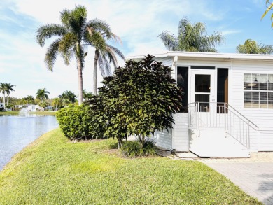Meticulously maintained, Waterfront, 2 bedroom, 2 bath home on Silver Lakes Resort and Golf Club in Florida - for sale on GolfHomes.com, golf home, golf lot