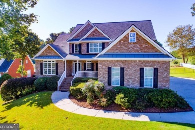 Overlooking the 17th green and inground pool, this gem is on Oak Mountain Championship Golf Club in Georgia - for sale on GolfHomes.com, golf home, golf lot