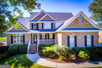 Overlooking the 17th green and inground pool, this gem is on Oak Mountain Championship Golf Club in Georgia - for sale on GolfHomes.com, golf home, golf lot