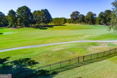 Overlooking the 17th green and inground pool, this gem is on Oak Mountain Championship Golf Club in Georgia - for sale on GolfHomes.com, golf home, golf lot