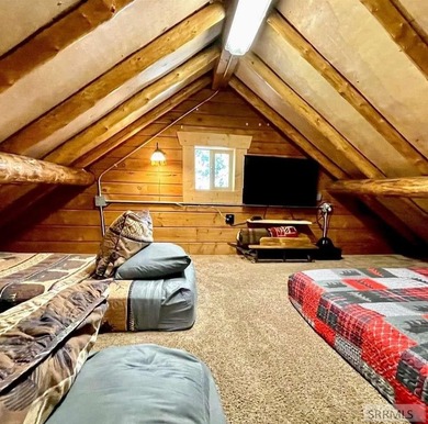 Turn-key and fully furnished, this exceptional cabin in Island on  in Idaho - for sale on GolfHomes.com, golf home, golf lot