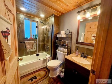 Turn-key and fully furnished, this exceptional cabin in Island on  in Idaho - for sale on GolfHomes.com, golf home, golf lot