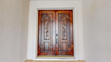 One or more photo(s) has been virtually staged. Mediterranean on Marsh Valley Country Club in Florida - for sale on GolfHomes.com, golf home, golf lot