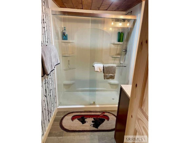 Turn-key and fully furnished, this exceptional cabin in Island on  in Idaho - for sale on GolfHomes.com, golf home, golf lot