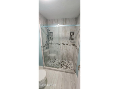 DON'T MISS this waterfront golf course gem in the heart of on The Club At Pelican Bay - North Course in Florida - for sale on GolfHomes.com, golf home, golf lot