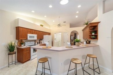 Welcome to effortless Florida living in this beautifully on Eagle Ridge At Spruce Creek Country Club in Florida - for sale on GolfHomes.com, golf home, golf lot