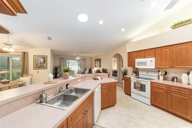 Welcome to effortless Florida living in this beautifully on Eagle Ridge At Spruce Creek Country Club in Florida - for sale on GolfHomes.com, golf home, golf lot