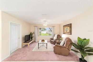 Welcome to effortless Florida living in this beautifully on Eagle Ridge At Spruce Creek Country Club in Florida - for sale on GolfHomes.com, golf home, golf lot