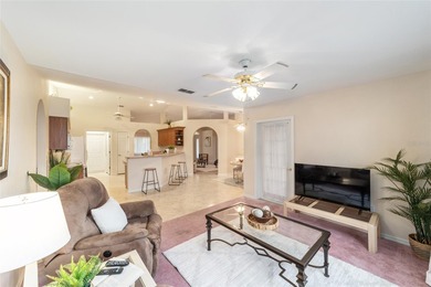 Welcome to effortless Florida living in this beautifully on Eagle Ridge At Spruce Creek Country Club in Florida - for sale on GolfHomes.com, golf home, golf lot