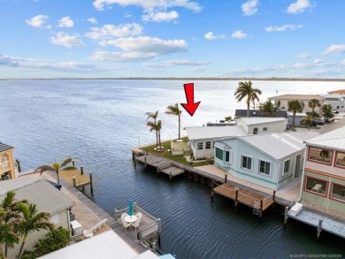 WATER, WATER EVERYWHERE! A RARE FIND--53 FEET OF OPEN WATER on Island Dunes Country Club in Florida - for sale on GolfHomes.com, golf home, golf lot