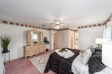 Welcome to effortless Florida living in this beautifully on Eagle Ridge At Spruce Creek Country Club in Florida - for sale on GolfHomes.com, golf home, golf lot