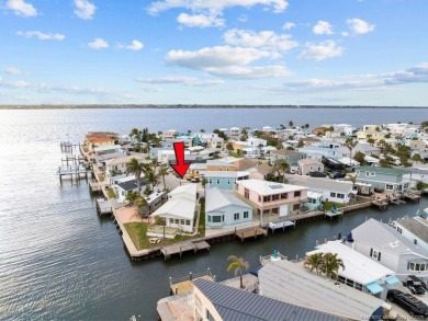 WATER, WATER EVERYWHERE! A RARE FIND--53 FEET OF OPEN WATER on Island Dunes Country Club in Florida - for sale on GolfHomes.com, golf home, golf lot