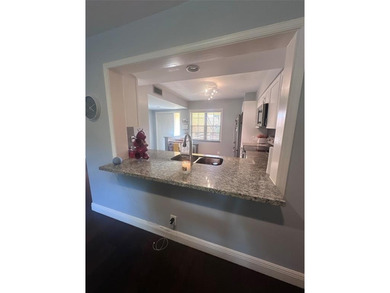 REDUCED PRICE!!This beautifully remodeled and tastefully on Indian Spring Golf and Country Club in Florida - for sale on GolfHomes.com, golf home, golf lot