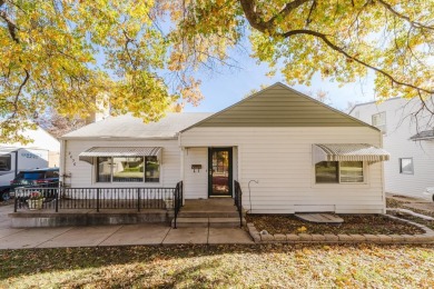 This 4-bedroom, 2-bathroom, over 2,300 square foot home, sits on L W Clapp Memorial Golf Course in Kansas - for sale on GolfHomes.com, golf home, golf lot