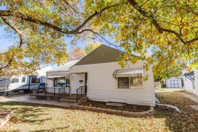 This 4-bedroom, 2-bathroom, over 2,300 square foot home, sits on L W Clapp Memorial Golf Course in Kansas - for sale on GolfHomes.com, golf home, golf lot