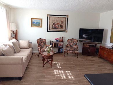 Motivated seller has reduced price $19K. CBS bldg. all tile on Kings Point Golf -Flanders Way in Florida - for sale on GolfHomes.com, golf home, golf lot