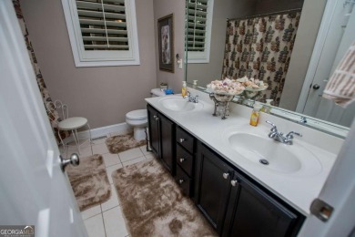 Another golf course beauty, located at Number 10, Oak Mountain on Oak Mountain Championship Golf Club in Georgia - for sale on GolfHomes.com, golf home, golf lot