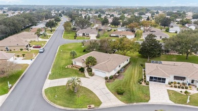 Welcome to effortless Florida living in this beautifully on Eagle Ridge At Spruce Creek Country Club in Florida - for sale on GolfHomes.com, golf home, golf lot