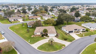 Welcome to effortless Florida living in this beautifully on Eagle Ridge At Spruce Creek Country Club in Florida - for sale on GolfHomes.com, golf home, golf lot