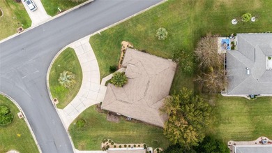 Welcome to effortless Florida living in this beautifully on Eagle Ridge At Spruce Creek Country Club in Florida - for sale on GolfHomes.com, golf home, golf lot
