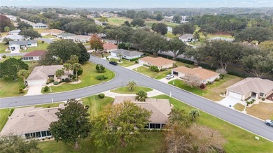 Welcome to effortless Florida living in this beautifully on Eagle Ridge At Spruce Creek Country Club in Florida - for sale on GolfHomes.com, golf home, golf lot