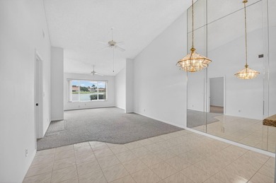 NICE VILLA OVER 1250 SF WITH A FABULOUS WATER VIEW. CATHEDRAL on Westchester Golf and Country Club in Florida - for sale on GolfHomes.com, golf home, golf lot