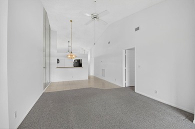 NICE VILLA OVER 1250 SF WITH A FABULOUS WATER VIEW. CATHEDRAL on Westchester Golf and Country Club in Florida - for sale on GolfHomes.com, golf home, golf lot