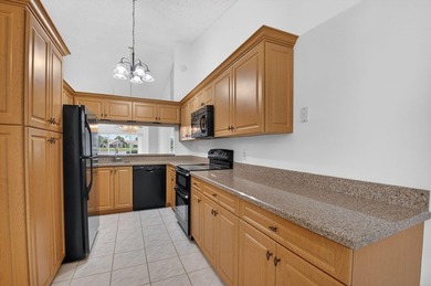 NICE VILLA OVER 1250 SF WITH A FABULOUS WATER VIEW. CATHEDRAL on Westchester Golf and Country Club in Florida - for sale on GolfHomes.com, golf home, golf lot