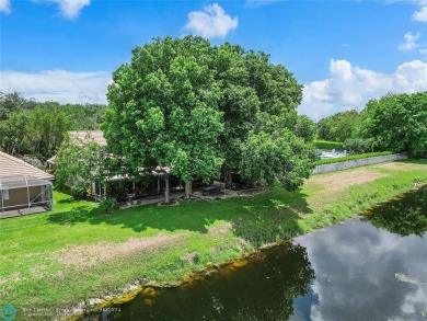 SUPERIOR HOME in a cul-de-sac, on a corner with sprawling views on TPC Eagle Trace in Florida - for sale on GolfHomes.com, golf home, golf lot