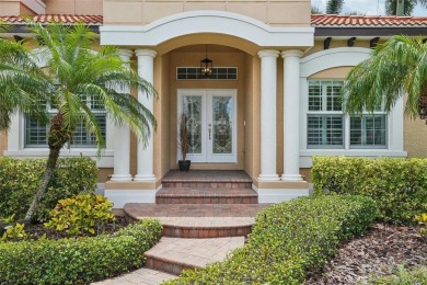 THIS HOME IS A  SUPER HERO that bravely fought the summer on Tarpon Springs Golf Course in Florida - for sale on GolfHomes.com, golf home, golf lot