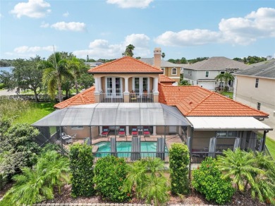 THIS HOME IS A  SUPER HERO that bravely fought the summer on Tarpon Springs Golf Course in Florida - for sale on GolfHomes.com, golf home, golf lot